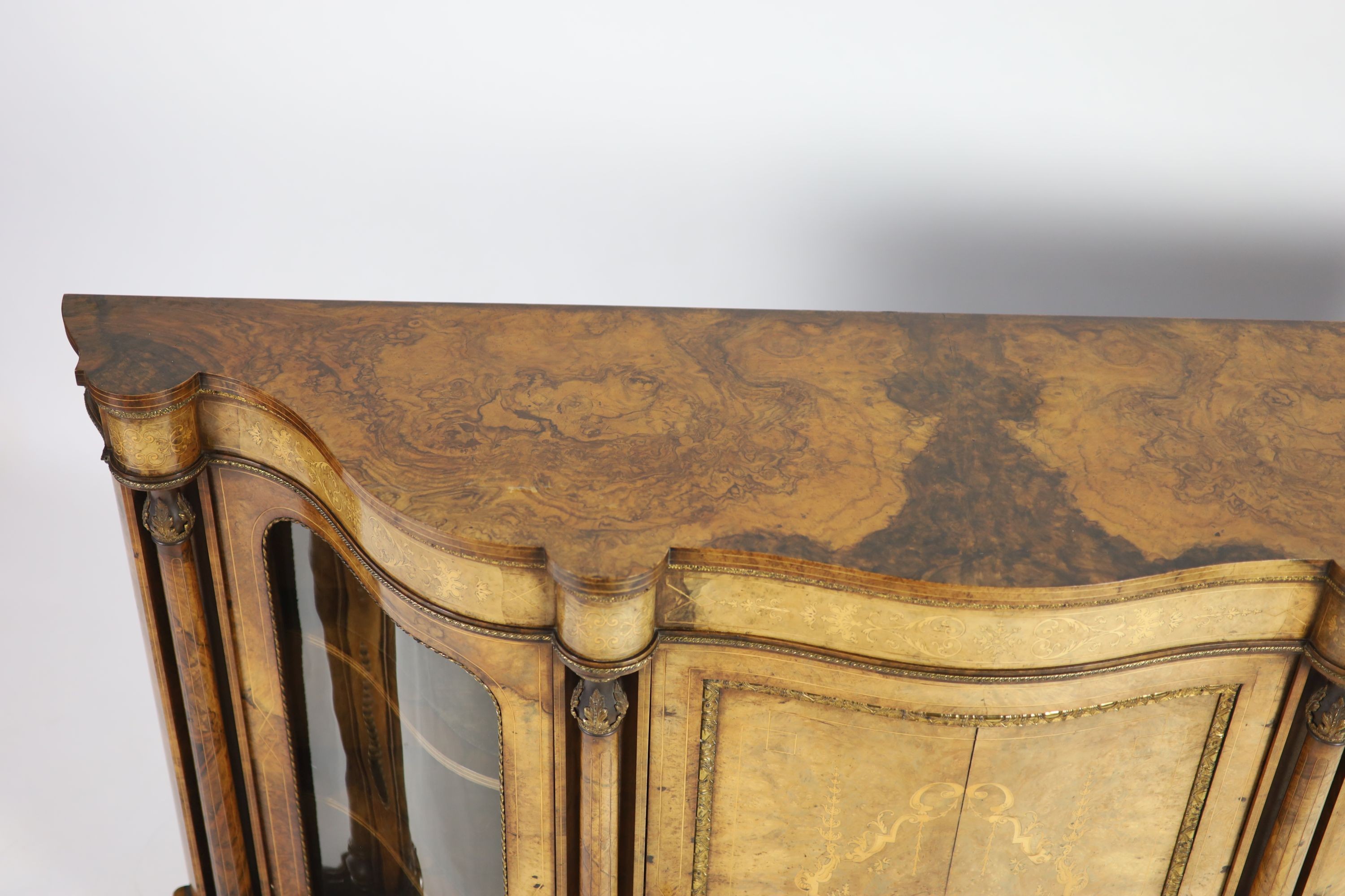 A Victorian marquetry inlaid figured walnut side cabinet W 186cm D 44cm H 110cm